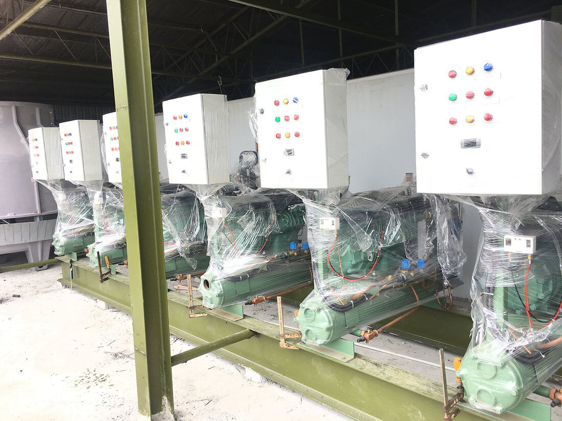 Row of new condensing units with electrical control boxes